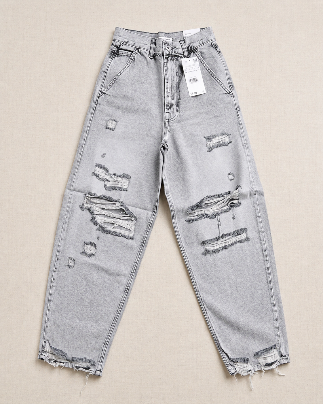 Jean large déchiré taille haute