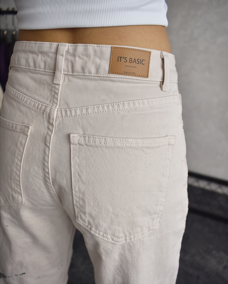 Jean large déchiré taille haute